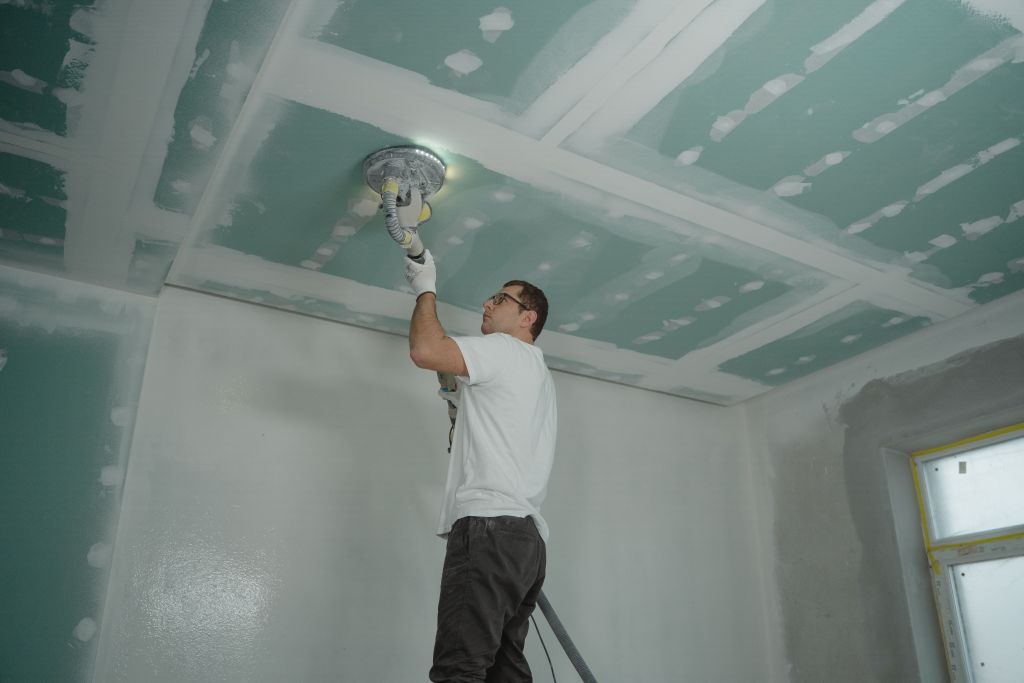 Drylining plasterboard installation and finishing